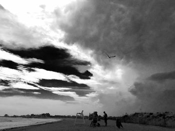 Low angle view of clouds over landscape