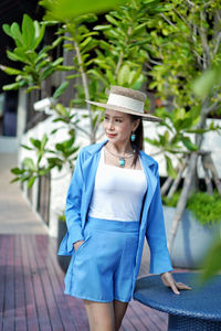 Portrait of a young woman wearing hat