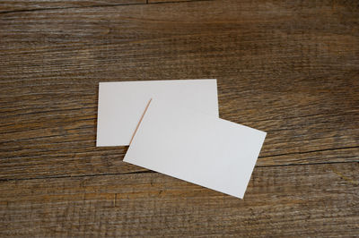 High angle view of paper on table
