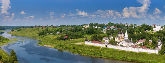 Landscape with volga river and dormition monastery in staritsa, russia