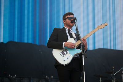Young man playing guitar