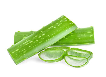 Close-up of green leaf against white background