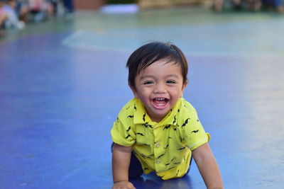 Portrait of a smiling boy in swimming pool