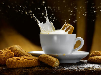 Close-up of coffee cup on table