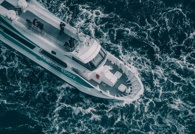 High angle view of ship sailing in sea