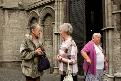 Group of people standing in front of building