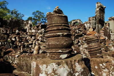 Old temple against buildings