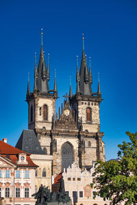 Low angle view of building against blue sky