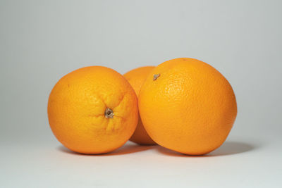 Close-up of orange fruits on table