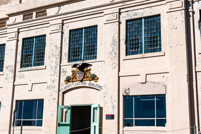 Low angle view of statue against building