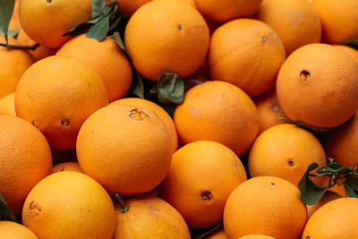 Full frame shot of oranges in market