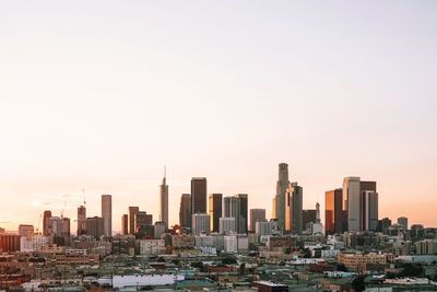 View of cityscape against clear sky