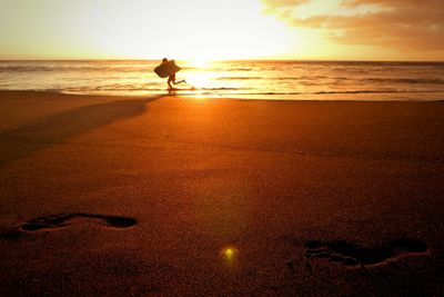 Scenic view of sea during sunset