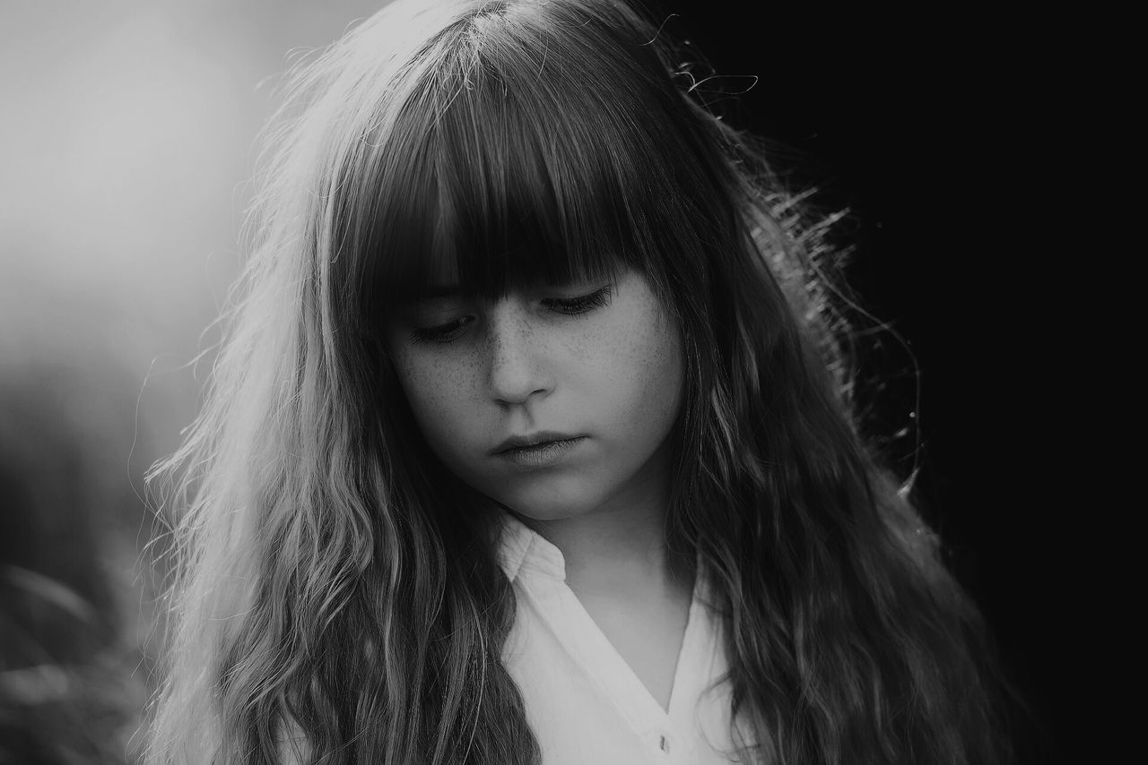 headshot, person, young adult, young women, lifestyles, portrait, looking at camera, close-up, long hair, contemplation, human face, front view, leisure activity, head and shoulders, serious, focus on foreground