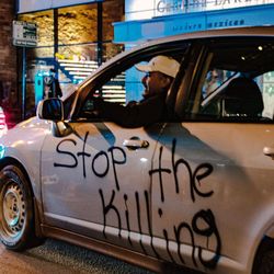 Portrait of man in car