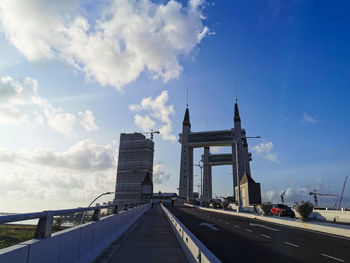 View of bridge against cloudy sky