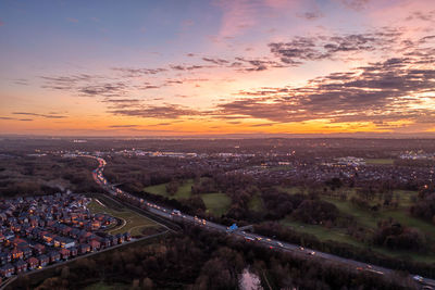 High angle view of cityscape against sky during sunset