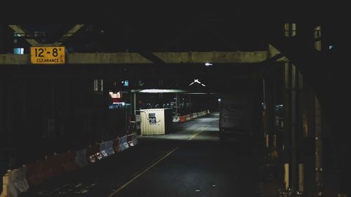 Train at railroad station at night