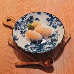 High angle view of sushi served on table