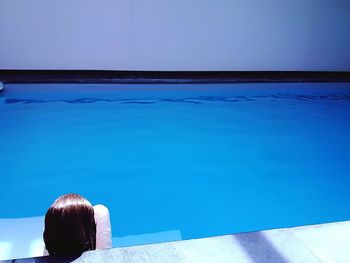 Woman swimming in pool