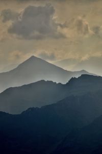 Scenic view of mountains against sky during sunset