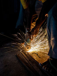 Low angle view of man working at factory