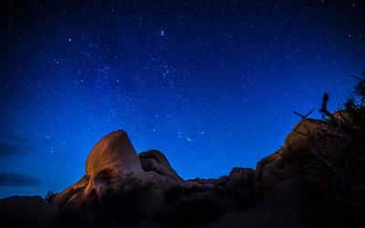 Low angle view of blue sky at night