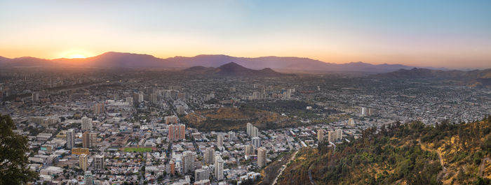 High angle view of townscape against sky during sunset