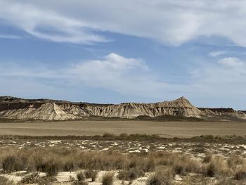 Scenic view of desert against sky