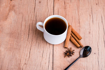 High angle view of coffee cup on table