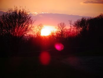 Scenic view of sunset over river