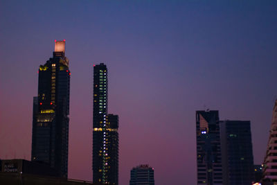 Skyscrapers in city at night