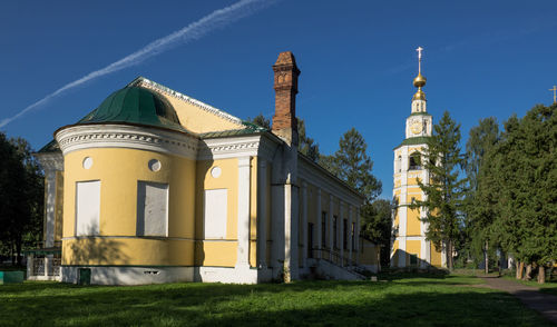 Facade of temple against blue sky