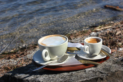 Close-up of coffee cup on table