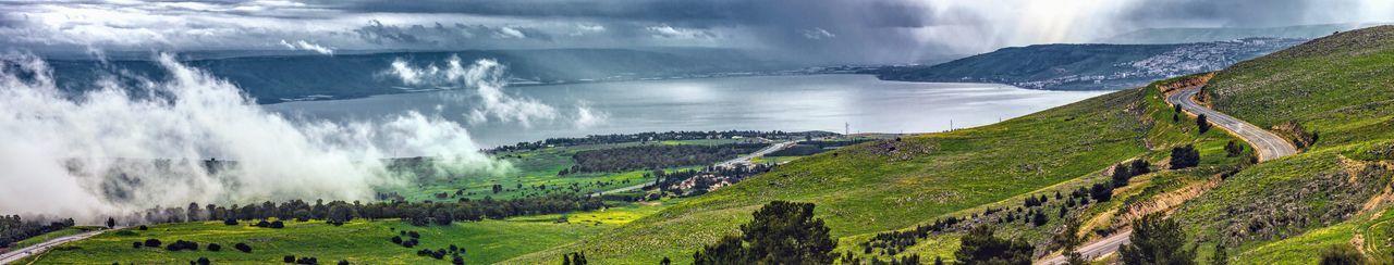 Panoramic view of waterfall against sky