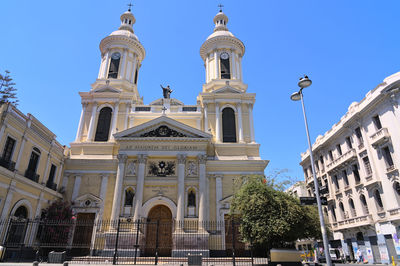 Low angle view of historic building against clear sky