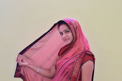 An asian girl in saree with white background