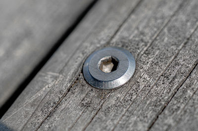 High angle view of wooden plank on table