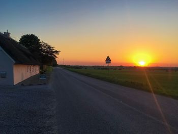 Road against sky during sunset