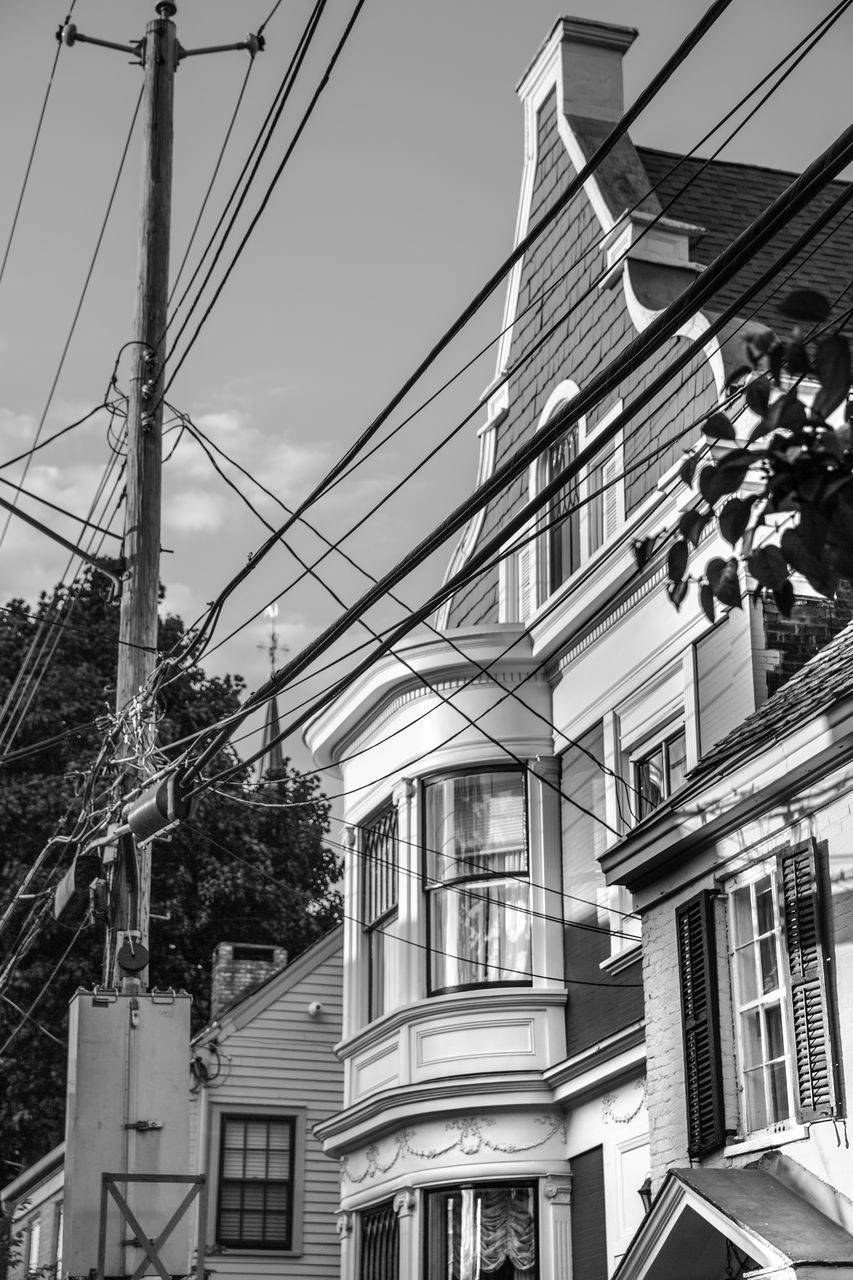 LOW ANGLE VIEW OF RESIDENTIAL BUILDINGS AGAINST SKY