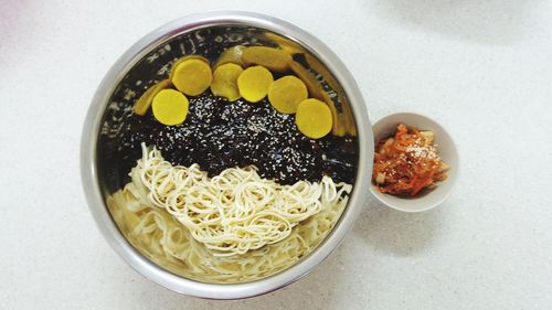 Directly above shot of food in bowls on table