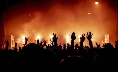 Silhouette crowd at music concert