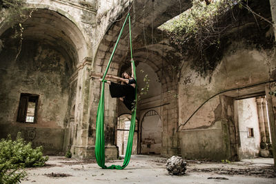 Man standing in abandoned building