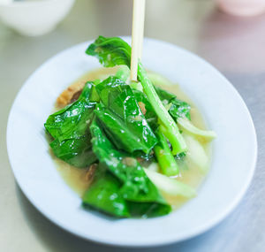 Close-up of salad in bowl on table