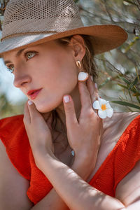 Close-up of young woman looking away