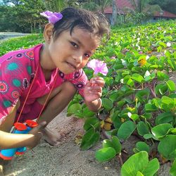 Portrait of cute girl with flowers