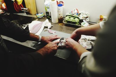 Cropped image of woman holding hands