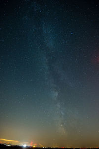 Scenic view of star field against sky at night