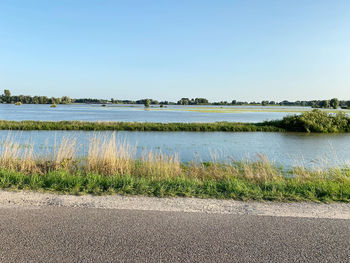 Scenic view of lake against clear sky