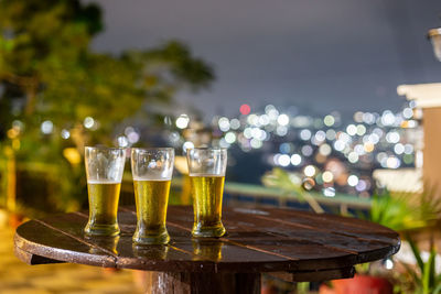 Close-up of beer glass on table